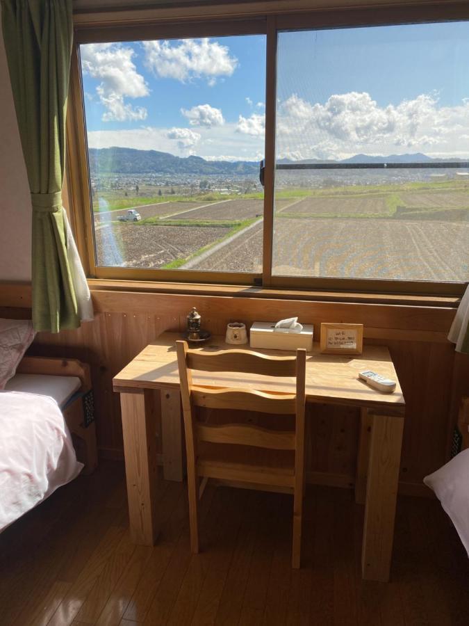 Azumino Backpackers 山の風 Hotel Matsukawa Buitenkant foto